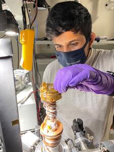 Photo above is Physics undergrad, Eric Chavez, in my lab loading a sample into the cryostat for electrical characterization. Eric was a huge help in moving my lab to the new space this past summer. 