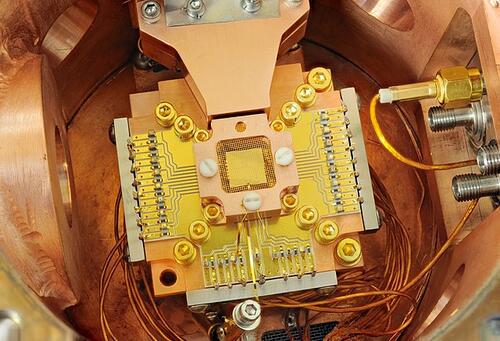 Chip ion trap for quantum computing at NIST. Image Credit: Y. Colombe/NIST