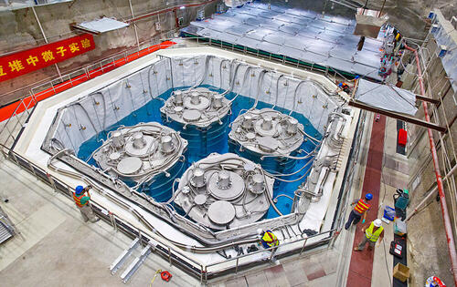 1 / 1 Bird's-eye view of the underground Daya Bay far detector hall during installation. The four antineutrino detectors are immersed in a large pool filled with ultra-pure water. Credit: Roy Kaltschmidt, Berkeley Lab