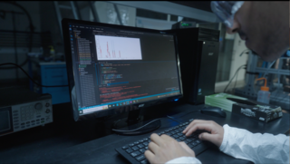 person at a computer.